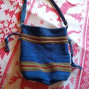 3 purses. 2 bucket bags & 1 vintage woven bag